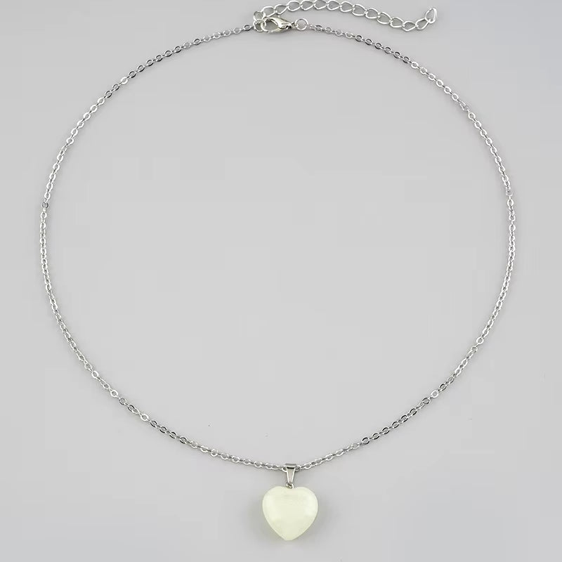 "Luminous Glow Necklace: Radiant Star & Heart Pendant"