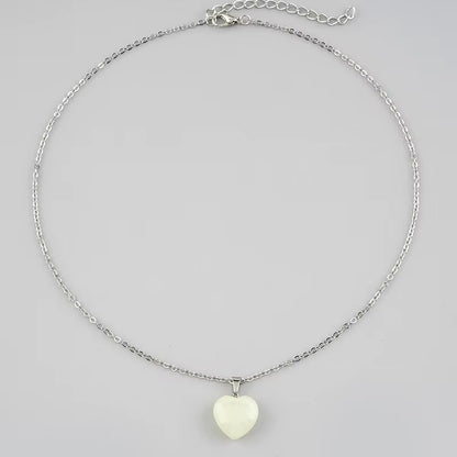 "Luminous Glow Necklace: Radiant Star & Heart Pendant"