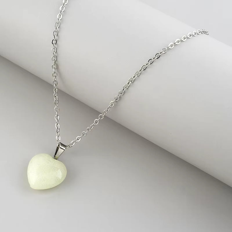 "Luminous Glow Necklace: Radiant Star & Heart Pendant"